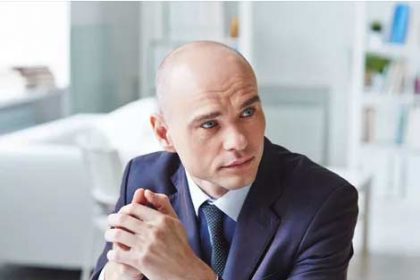 A professional businessman considers options for a study abroad program in Australia.