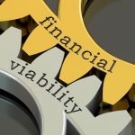 Golden gears represent financial viability within the vet sector, highlighting risk assessment.