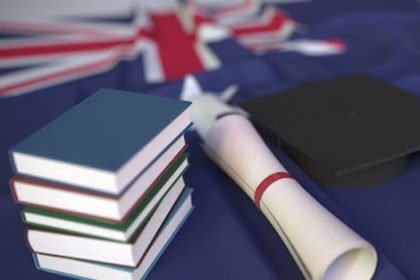 A graphic representing education includes a graduation cap and books, relevant to vet compliance.