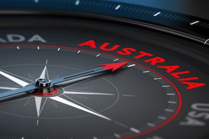 A compass points towards Australia, representing the new skills assessment framework for skilled migrants.