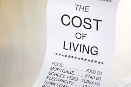 A receipt showing high food, mortgage, and school fees illustrates the impact of the cost of living on international.